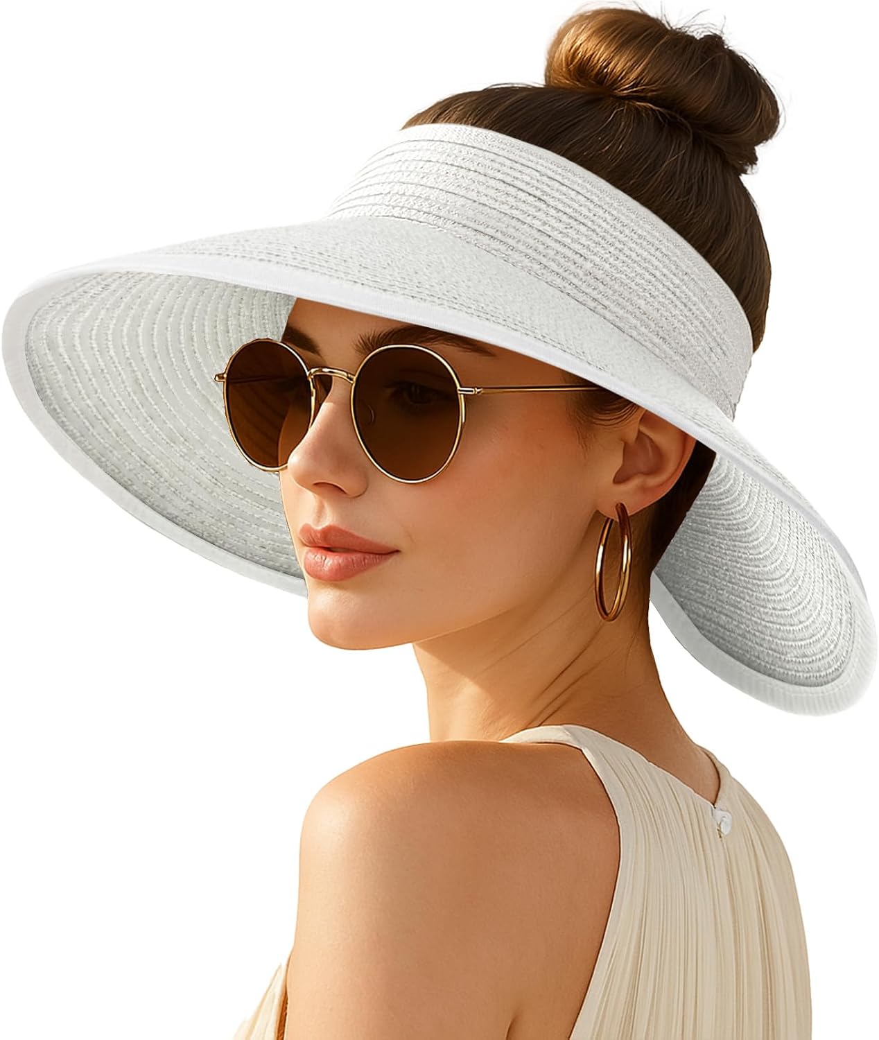 Wide-brimmed straw beach hat; hat designed for ponytails