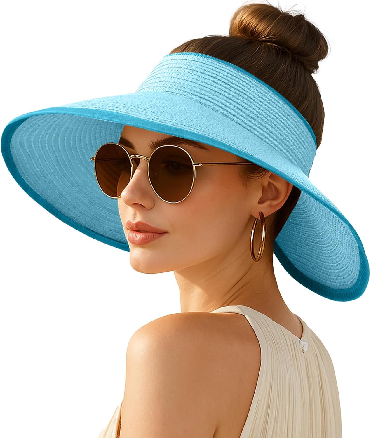 Wide-brimmed straw beach hat; hat designed for ponytails