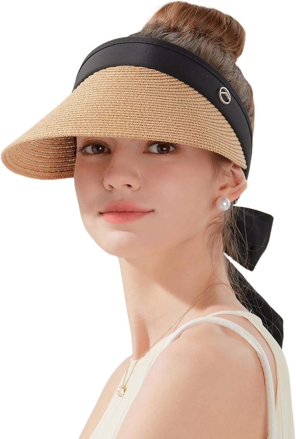 Wide-brimmed straw beach hat; hat designed for ponytails
