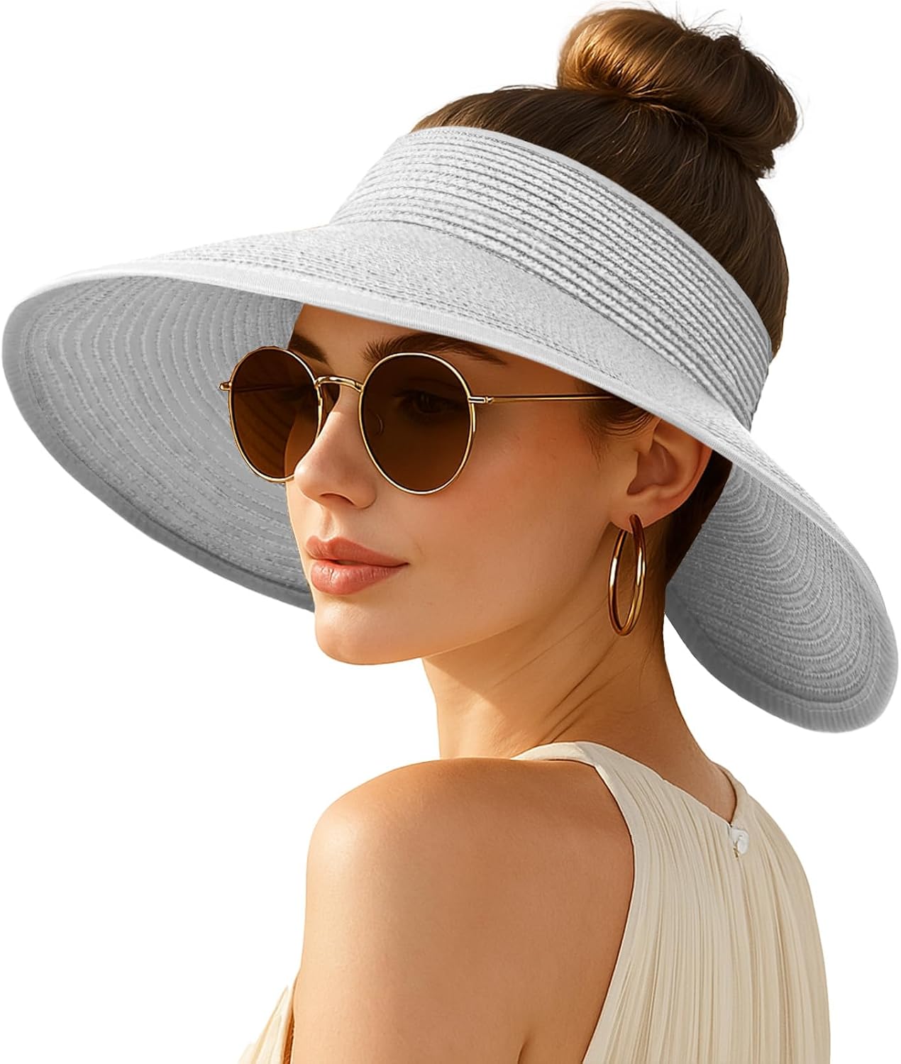 Wide-brimmed straw beach hat; hat designed for ponytails