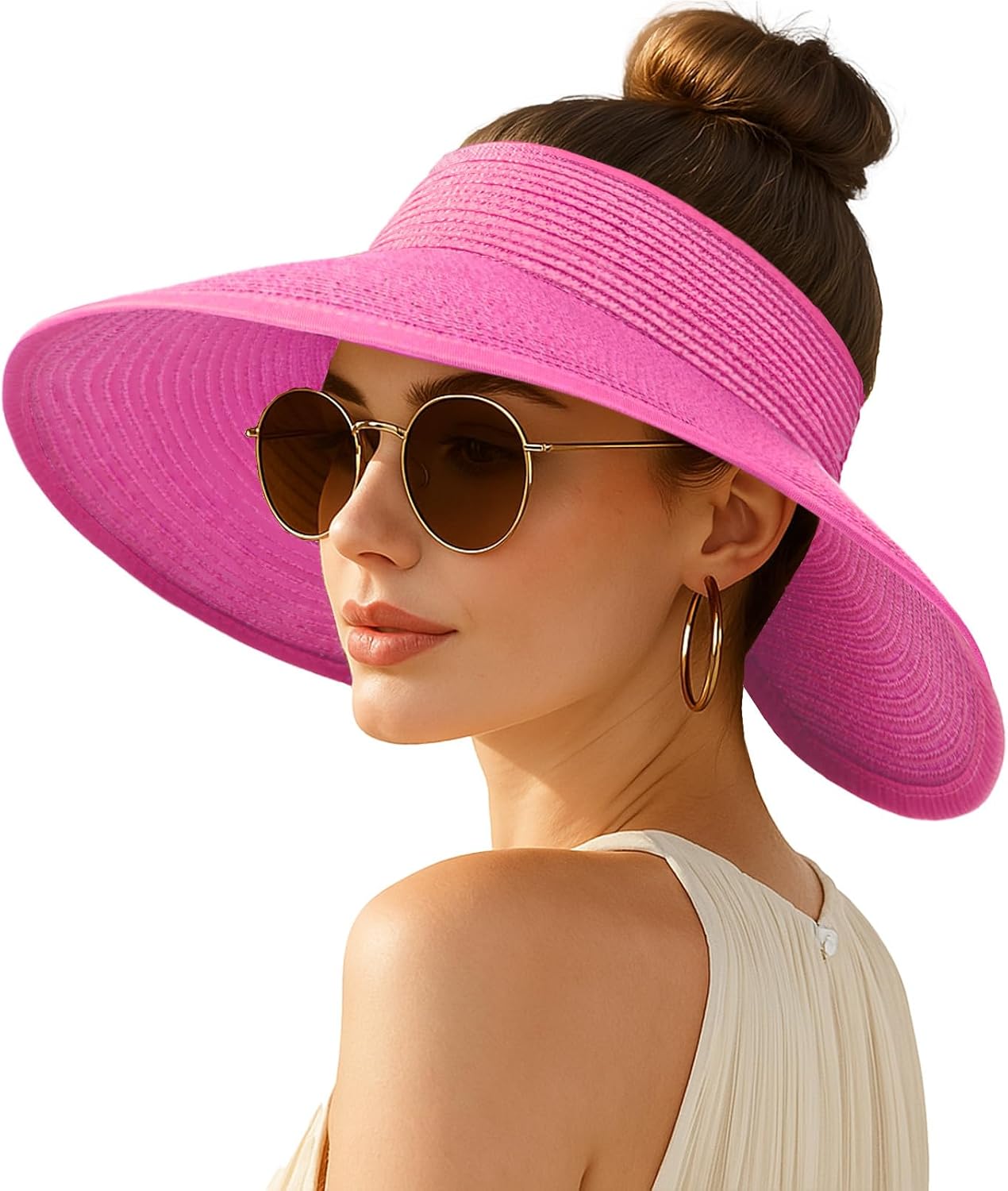 Wide-brimmed straw beach hat; hat designed for ponytails