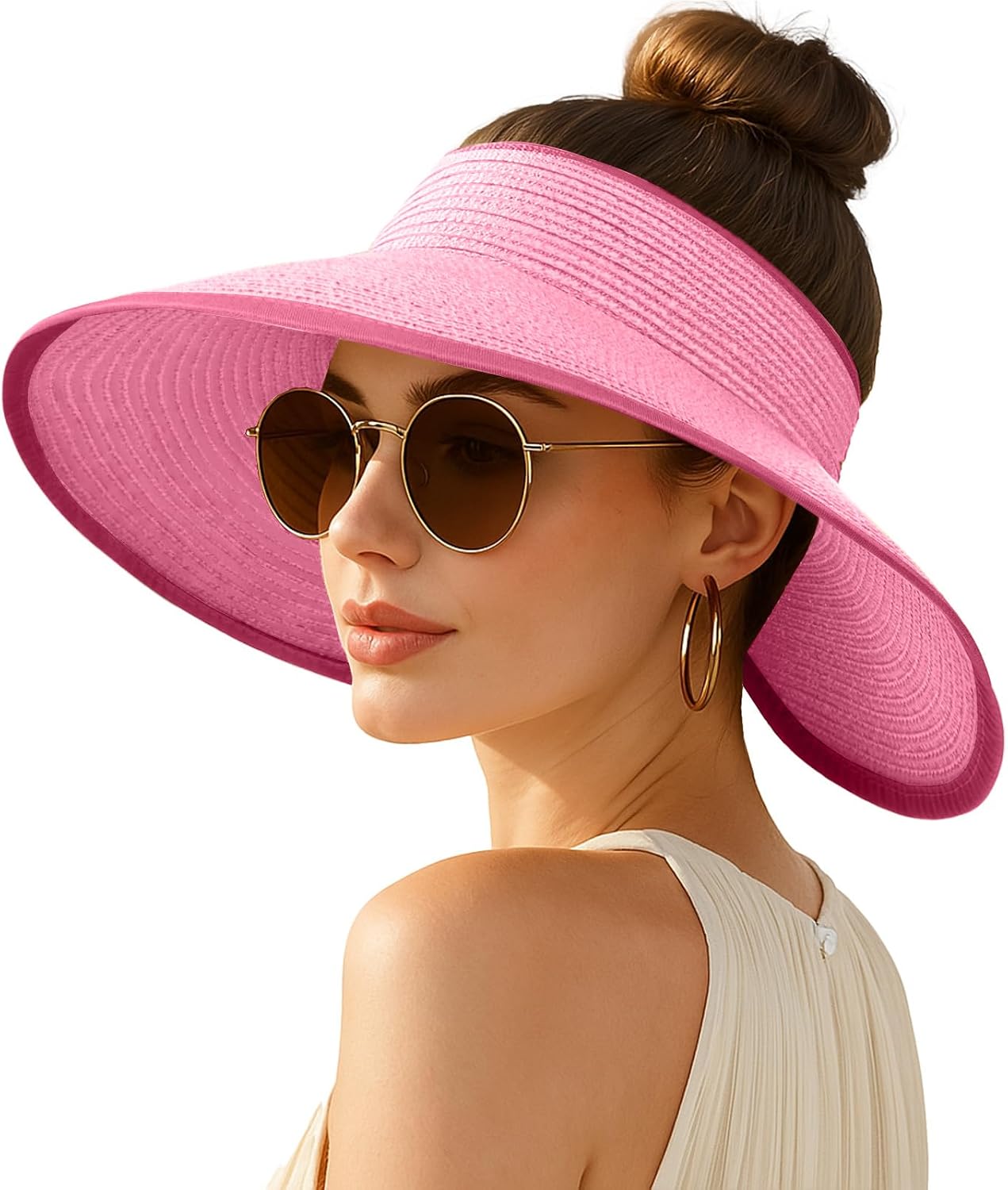 Wide-brimmed straw beach hat; hat designed for ponytails