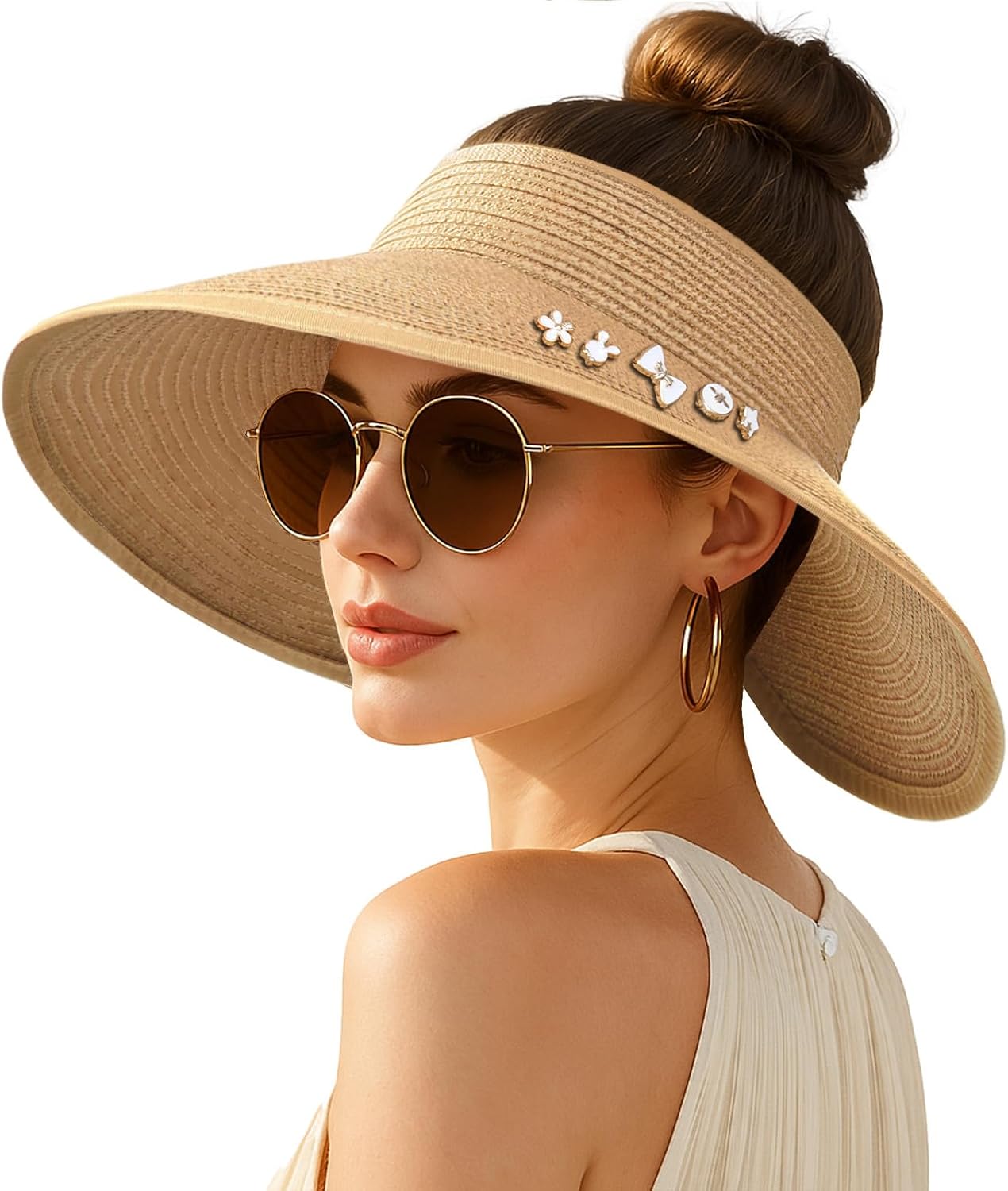 Wide-brimmed straw beach hat; hat designed for ponytails